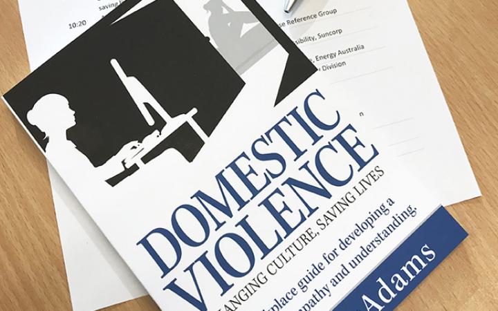 A book on domestic violence sitting on a table